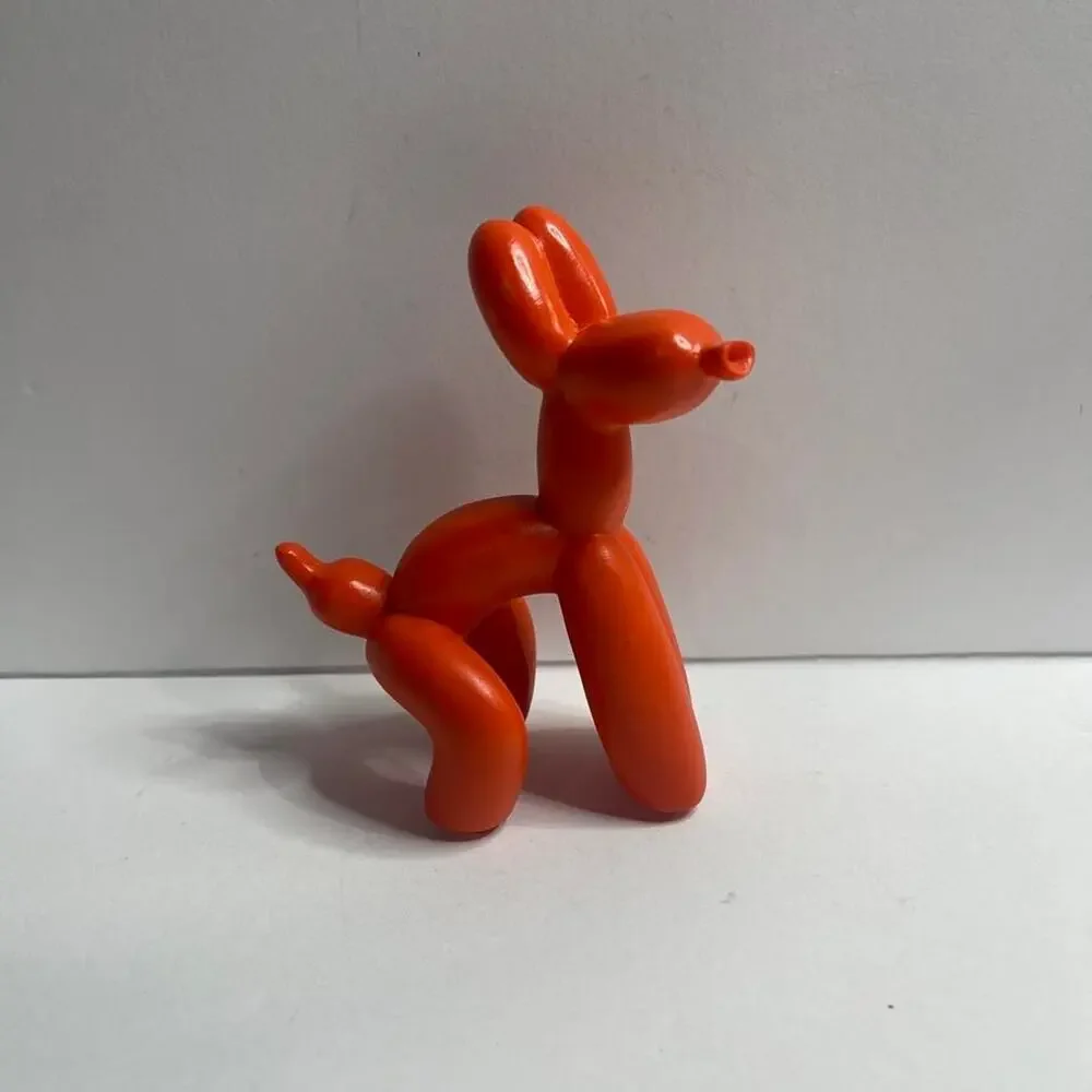 Orange Balloon Dog Pooping Ballon Dog figurine